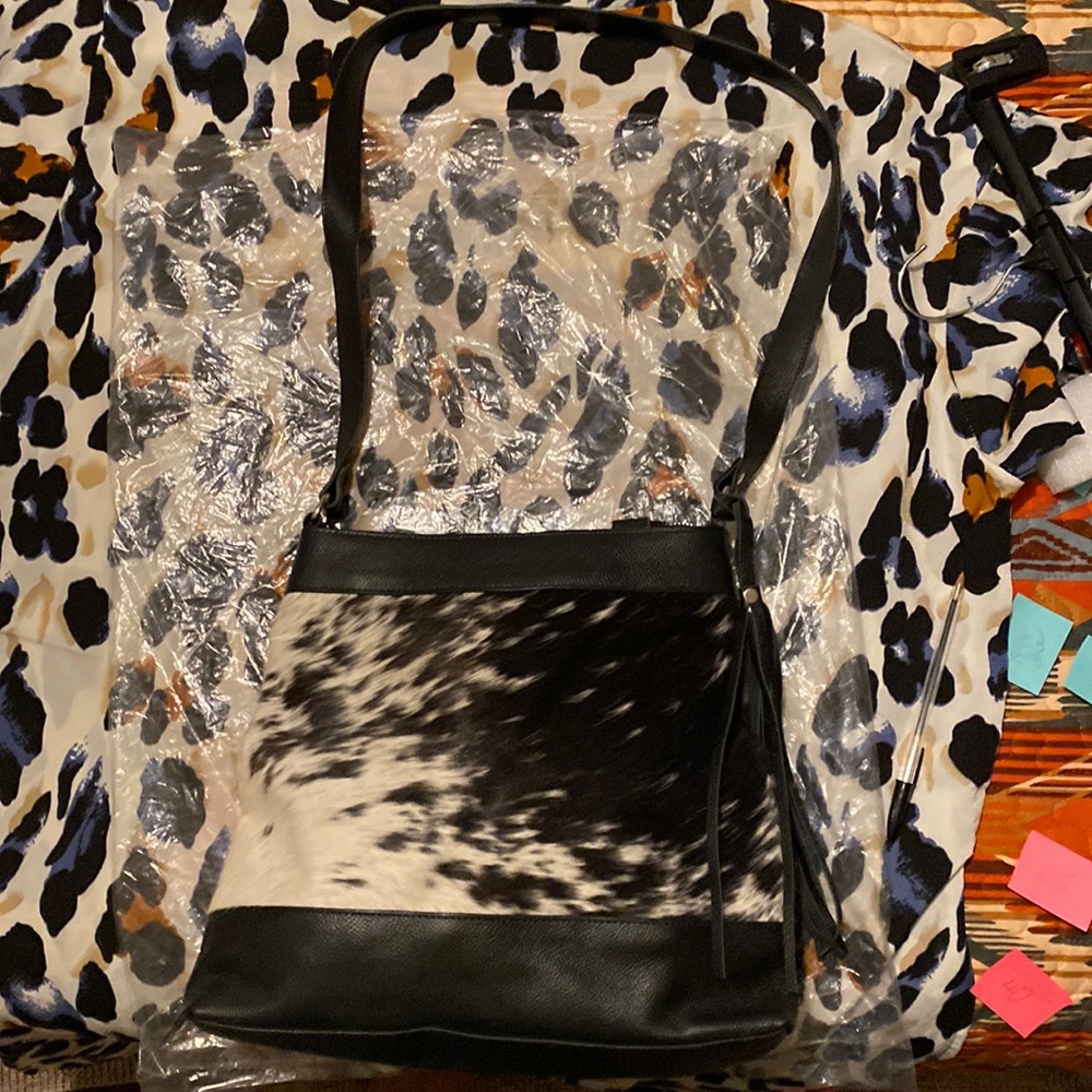 New Black and White hair on purse.